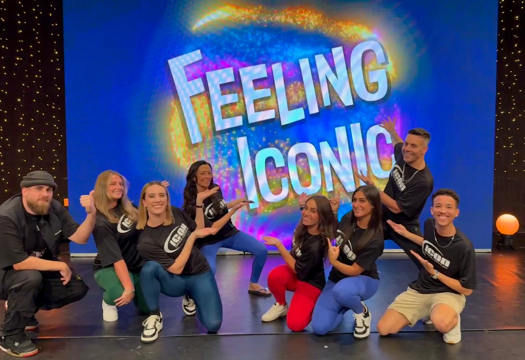 ICON staff on stage in front of the Feeling Iconic backdrop