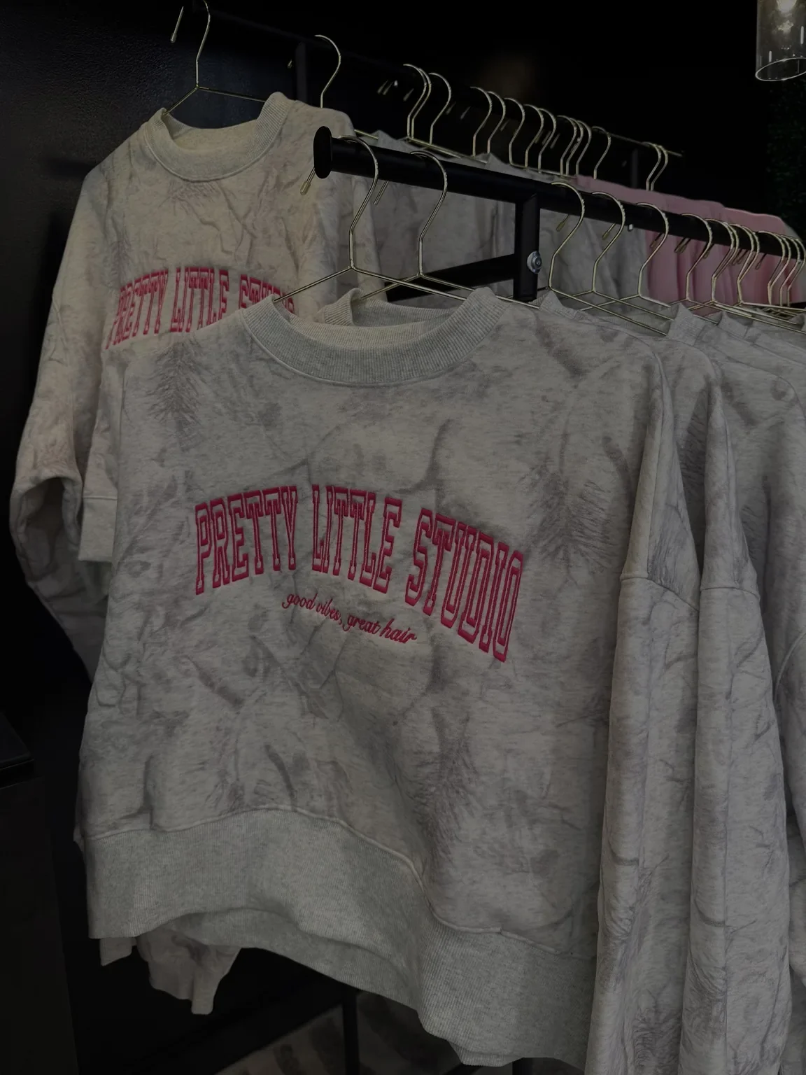 Pretty Little Studio crewneck sweatshirts on the rail